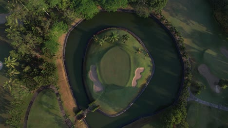 Aerial-view-of-swirling-golf-course-artificial-river