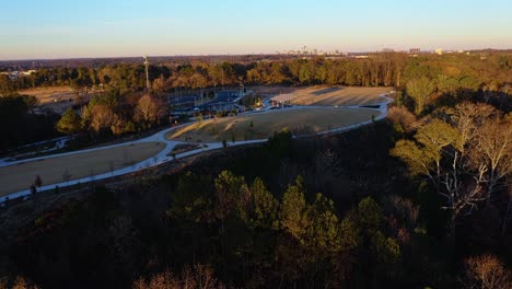 Panoramic-aerial-view-of-Westside-Reservoir-Park-and-the-Atlanta-skyline-in-the-background,-Georgia,-USA