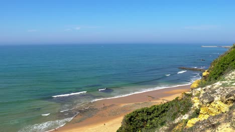 Portugal,-Carvoeira,-Foz-do-Lizandro-pristine-beach-with-amazing-shoreline-as-the-ocean-meets-with-the-land