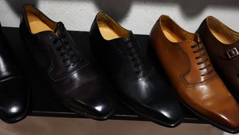 Different-color-handmade-leather-shoe-samples-at-tailor-indoor-store