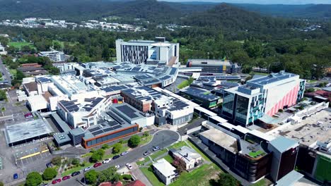 Drone-aerial-landscape-Gosford-Hospital-healthcare-services-surgery-main-town-CBD-city-medical-infrastructure-government-Central-Coast-Australia-4K