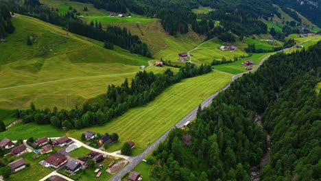 Aerial-of-Sorenberg-village-in-the-Swiss-Alps-in-the-mountains,-remote-Swiss-village-landscape,-Europe