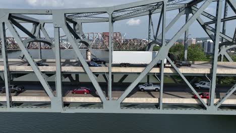 Traffic-on-Brent-Spence-Bridge-exiting-Cincinnati,-Ohio-and-entering-Covington,-Kentucky-over-the-Ohio-River