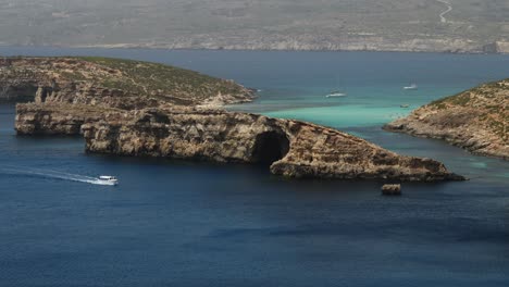 Telephoto-View-Of-The-Small-Islets-Of-Blue-Lagoon-In-Comino-Island