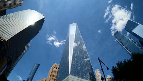 Timelapse-of-One-World-Trade-Centre,-with-Reflection-and-Clouds