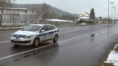 Slovenian-police-car-parked-at-closed-border-crossing-in-time-of-Coronavirus-outbreak