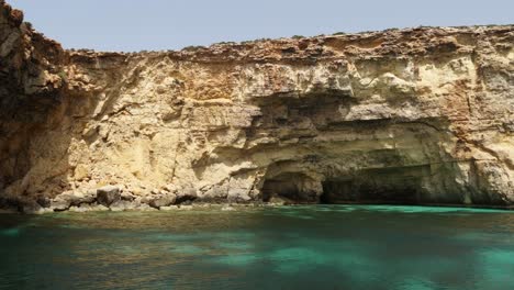 Static-Shot-Of-The-Cliff-In-Crystal-Lagoon,-Comino-Island