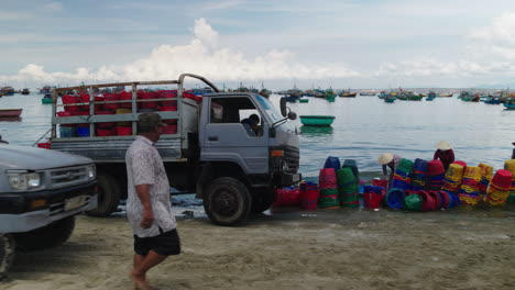 Transport-of-fish-baskets-to-main-markets-from-Mui-Ne-beach