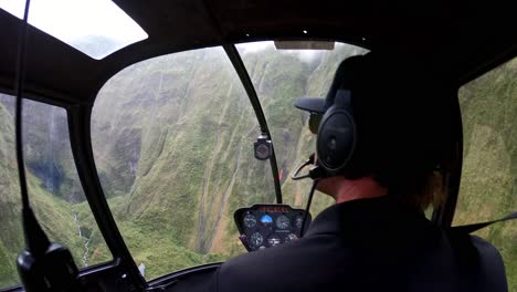 Open-Door-Helictoper-Flying-Inside-Canyon-in-Kauai,-Hawaii