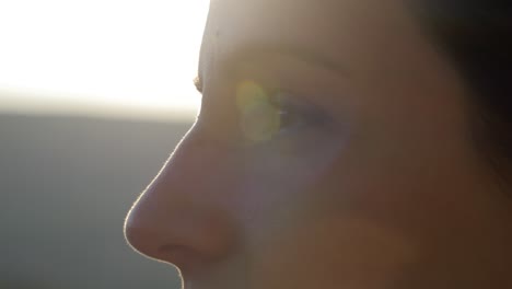 Close-up-of-the-eyes-of-a-woman-during-sunset