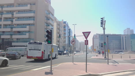 Day-time-land-close-view-at-RTA-Bus-with-Together-We-Overcome-Challenges-MOHRE-campaign-logo-in-traffic-near-Mall-of-the-Emirates-station-in-Dubai-UAE-in-September-2020