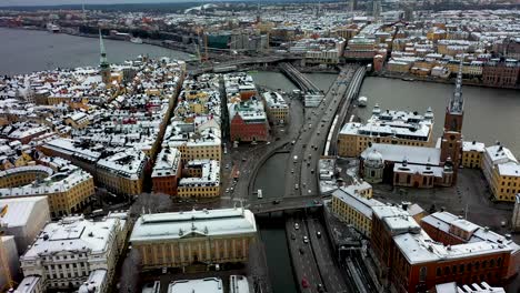 Panning-drone-footage-of-Gamla-Stan,-the-old-town-located-in-Stockholm,-Sweden