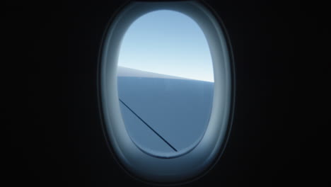 Blick-Durch-Das-Flugzeugfenster,-Zeitlupe