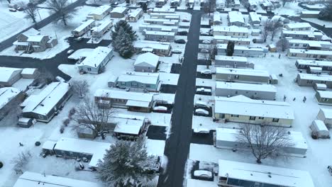 Mobile-home-trailer-park-covered-in-snow-during-winter