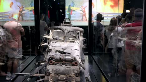 The-remains-of-Romain-Grosjean's-destroyed-car-after-suffering-an-accident-at-the-2020-Bahrain-Grand-Prix-is-seen-displayed-during-the-world's-first-official-Formula-1-exhibition