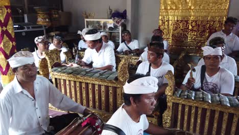 Asian-Music-Percussion-Group-Play-Traditional-Gong-Gamelan-Music,-Bali-Indonesia-in-a-Religious-Balinese-Hindu-Ceremony