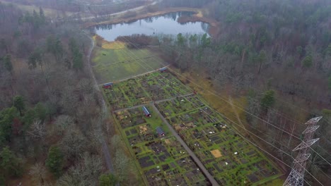 Aerial-footage-over-a-farm-located-in-a-nature-park-beside-Stockholm-University