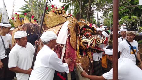 Mythical-Creature-Barong-comes-to-Life-in-Captivating-Walking-Procession-at-Bali-Indonesia,-Balinese-Hindu-Religious-Temple-Ceremony,-Southeast-Asia