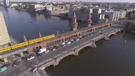 A-smooth-drone-flight-over-a-bridge-in-Berlin
