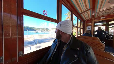 man-traveling-on-the-soller-tram