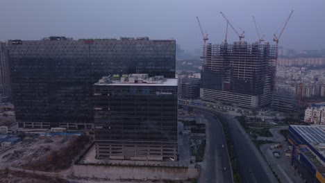Aerial-view-of-LTI-Mindtree-Office-Towers-on-Hitech-City-Main-Road-of-Hyderabad-at-early-morning-dawn-with-Ikea-Store-on-right-side,-Hyderabad
