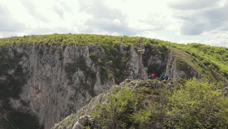 Mountaineers-on-the-summit-of-a-cliff---Cheile-Turzii