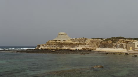 Rock-Formation-In-Xwejni-Bay,-Near-The-Salt-Pans-In-Zebbug,-Gozo