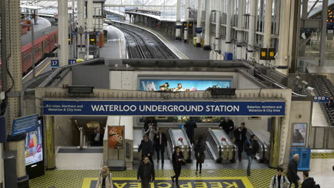 Passengers-enter-and-exit-through-the-Waterloo-Station-underground-gate