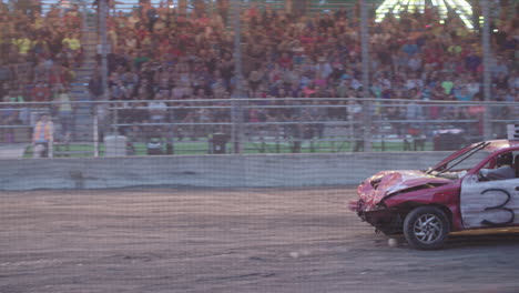 Demolition-Derby-Car-Sandwiched-by-two-other-during-a-Derby