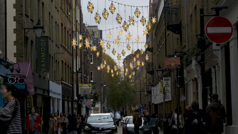 London-retail-shopping-district-with-holiday-decorations-to-celebrate-Christmas-season