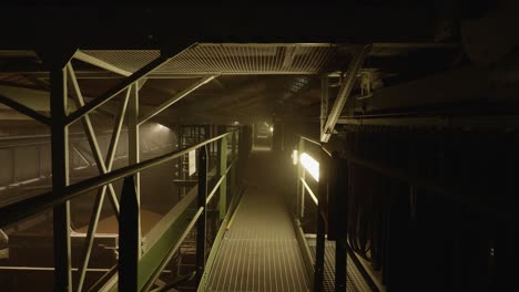 POV-Looking-Down-Walkway-Inside-Wheat-Factory