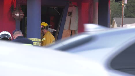 firefighters-board-up-crashed-into-building