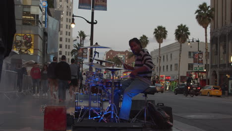 Very-skilled-drummer-plays-loudly-on-Hollywood-Blvd-Walk-of-Fame-across-from-the-El-Capitan-theater-in-Los-Angeles