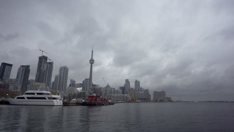 Skyline-of-downtown-Toronto-seen-from-Ireland-Park-on-cloudy-day,-wide