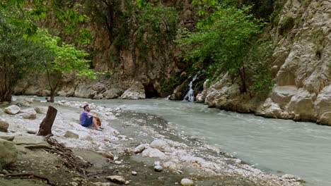 Couple-experience-Saklikent-gorge-steep-canyon-with-rushing-rapid-waters