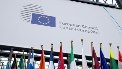 Panning-shot-of-the-EU-logo-inside-the-European-Council-building-in-Brussels,-Belgium