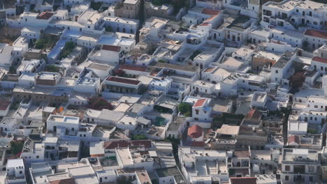 Tight-circling-aerial-shot-over-Lindos-town-houses