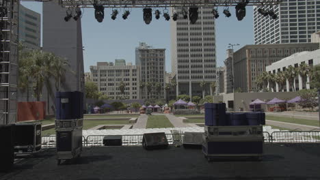 Mostly-empty-stage-before-concert-from-perspective-of-the-performer-of-Pershing-Square-in-Downtown-Los-Angeles,-California