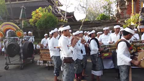 Balinese-Musicians-Play-Drums-Flutes-and-Gamelan-Drums-at-Hindu-Temple-Ceremony-Outdoors,-Bali-Indonesia