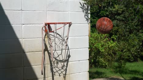 Fail-Ball-in-House-Basket-Hood,-Slow-Motion