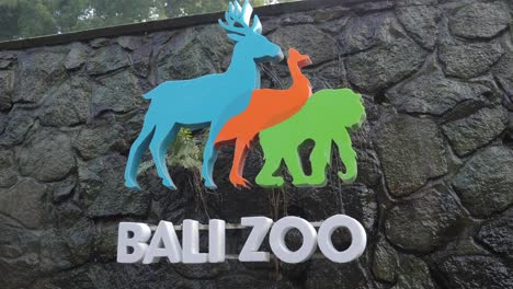 Signage-Bali-zoo-with-colourful-cutout-animals-on-wall