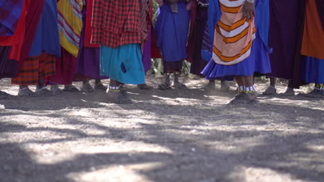 Traditional-African-Jumping-Dance-Performed-By-Women-From-Massai-Tribe,-Tilt-Down-Slow-Motion