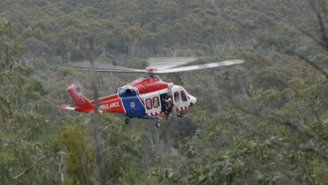 Air-ambulance-victoria-rescue-You-Yangs-winching-up-hiker