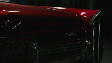 Close-view-of-the-trunk-and-tail-lights-of-a-red-Cadillac-Deville