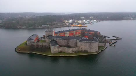 Drone-footage-approaching-the-Vaxholm-Fortress-from-the-main-island-of-Vaxholm