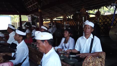 Gamelan-Music-Orchestra-Plays-Percussion-Instruments-in-Bali-Indonesia-at-Hindu-Temple-Ceremony-in-Bedulu,-Samuan-Tiga