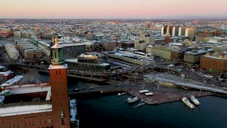 Panning-drone-footage-revealing-the-City-Hall-of-Stockholm,-Sweden