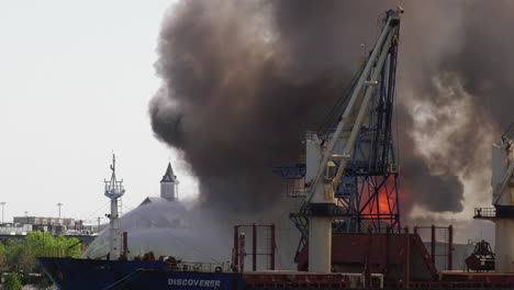 Intense-flames-and-smoke-rise-from-the-wreckage-of-the-Domino-Sugar-plant