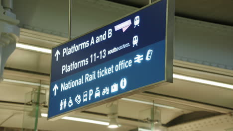 Focus-and-defocus-on-a-hanging-platform-sign-at-St-Pancras-International-Station-in-London