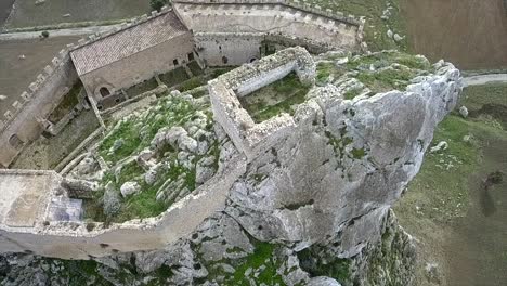 Drone-shot-tilting-and-flying-backwards-from-the-castle-of-Mussomeli-in-Sicily